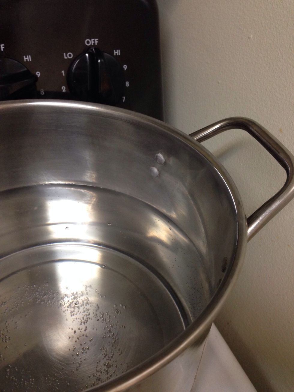 In a large pot, boil your water for your angel hair pasta.