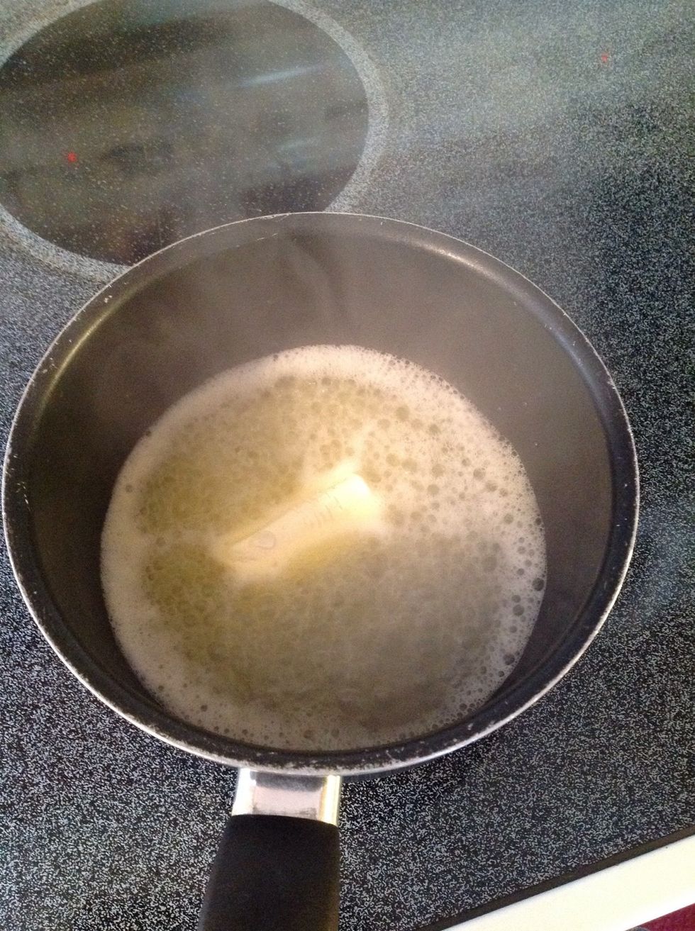 In a large pot or pan, bring water and butter to a rolling boil.