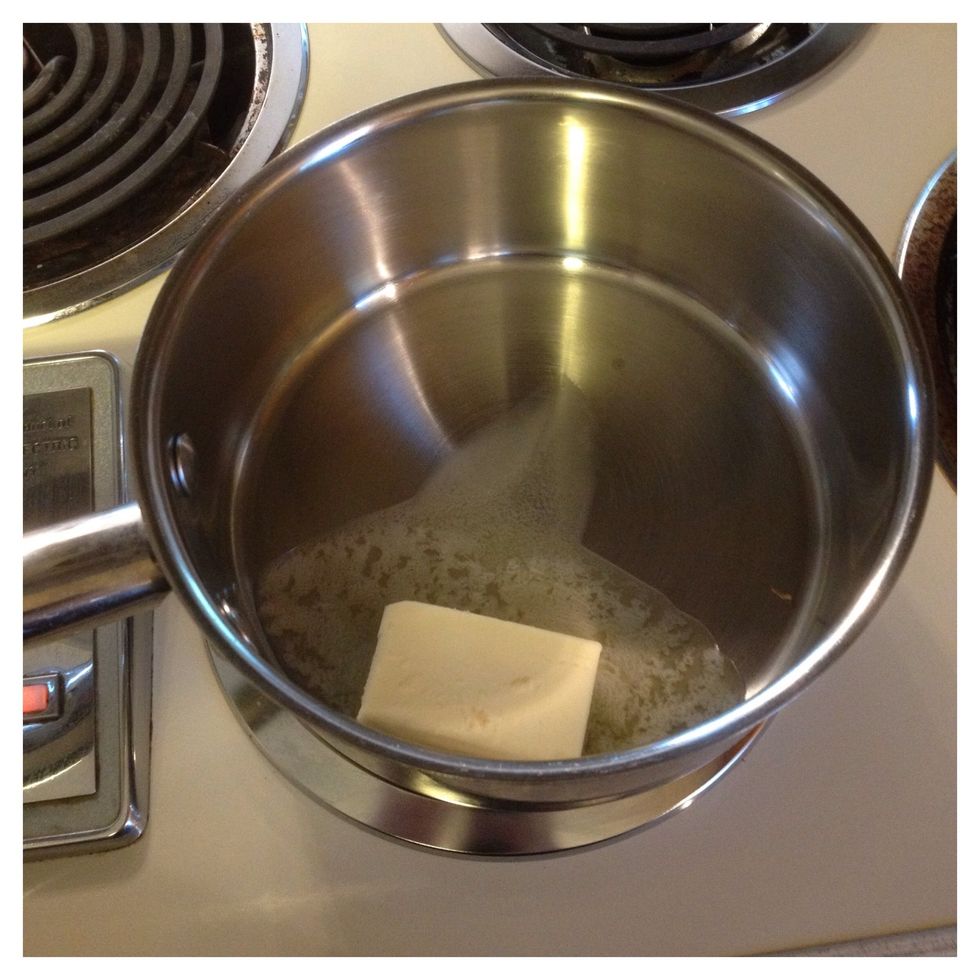 In a large sauce pan melt butter over medium low heat.