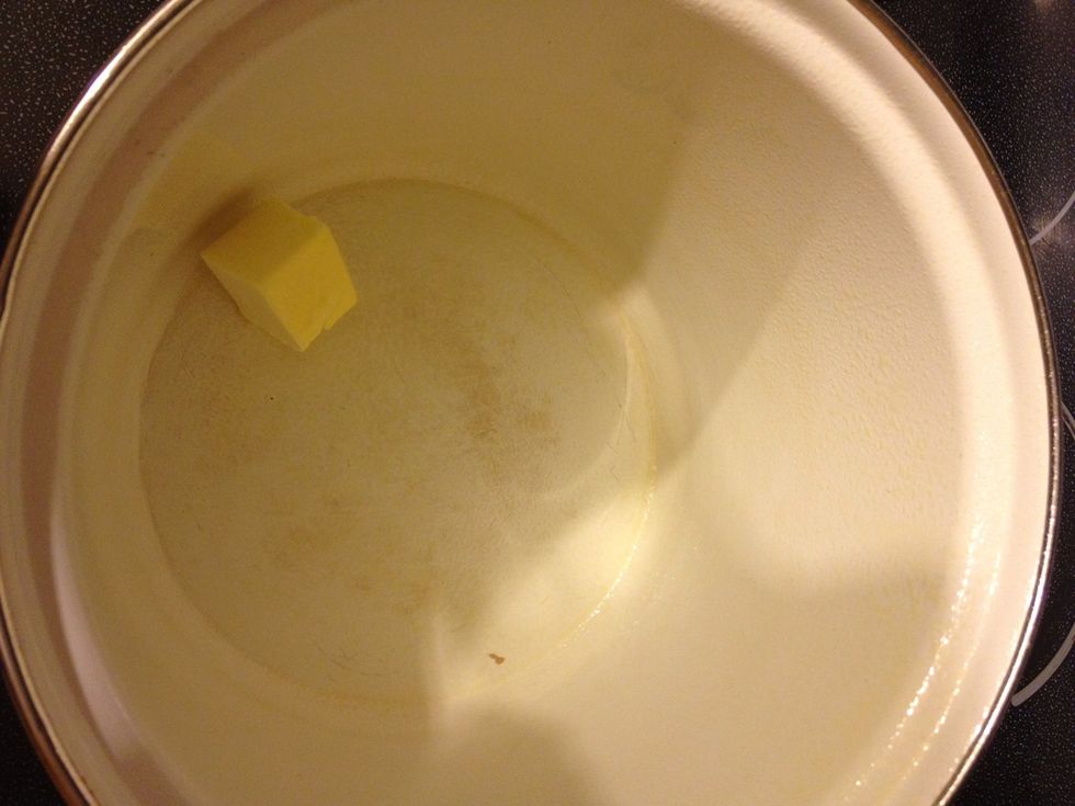In a large stock pot melt 2 tablespoons of butter. I also sprayed the pan just to be sure nothing would stick!