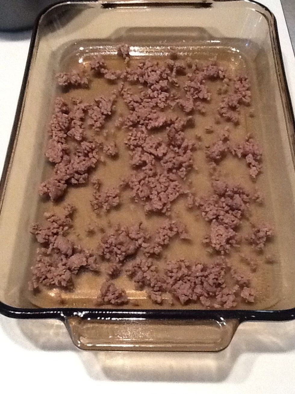 In a lightly greased pan, add half of the ground meat. If you want your lasagna really beefy, you might want to cook 2 lbs. of meat instead of 1lb.