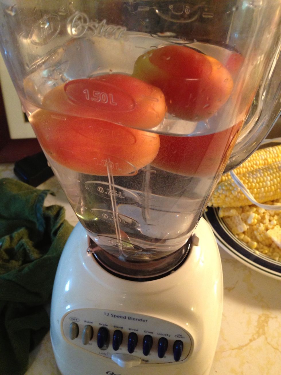 In a liter of water blend 2 tomatoes