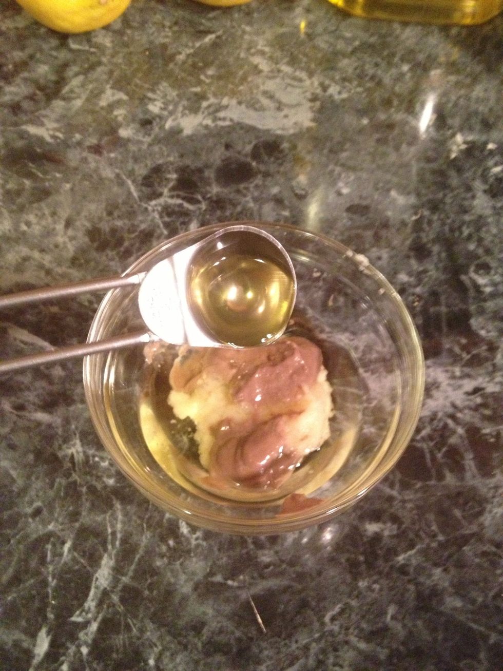 In a little bowl mix the garlic and the anchovy paste.