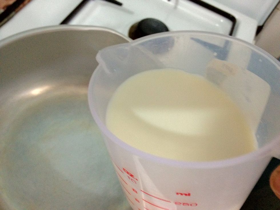 In a low to medium heat, add in 1 cup of milk