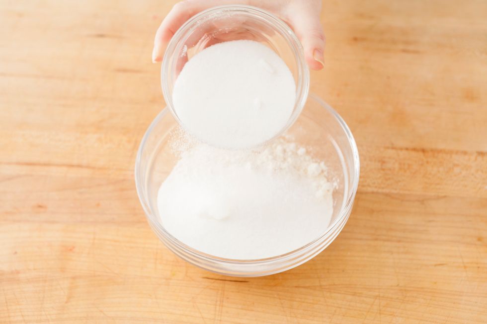 In a medium mixing bowl, mix together flour and sugar.