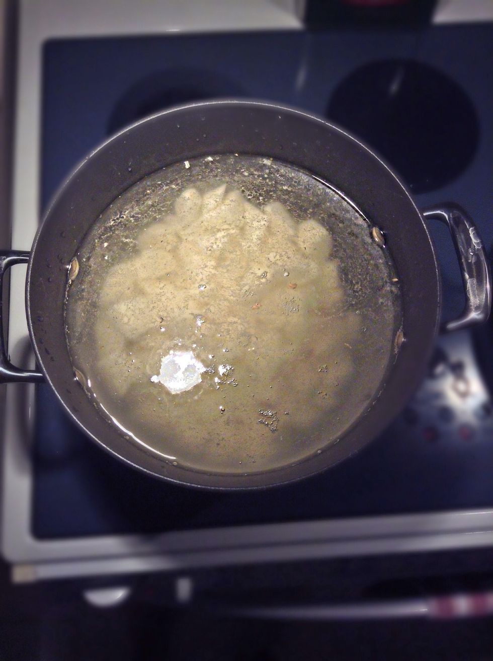 In a medium pan, cover them with an inch or two of cold water. Place over medium-high heat and bring to a boil. Reduce the heat and simmer for 18-20 minutes, until the potatoes are completely tender.
