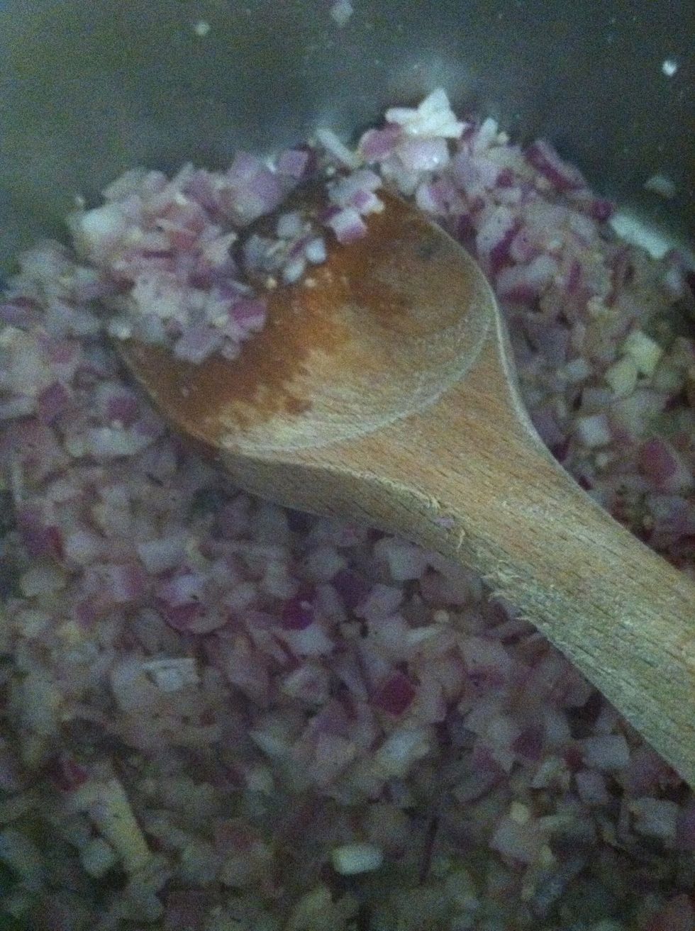 In a medium pan heat 2 Tbsp of olive oil and then add the diced onions.