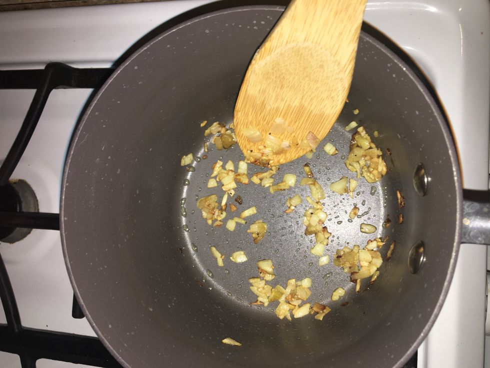 In a medium pot, heat 1 teaspoon of olive oil on medium-high until hot. Add the remaining garlic and season with salt and pepper. Cook, stirring frequently , 1 to 2 minutes, or until golden brown