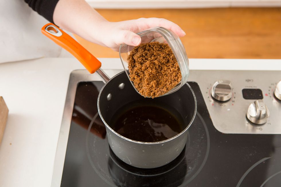 In a medium saucepan, add water and brown sugar.