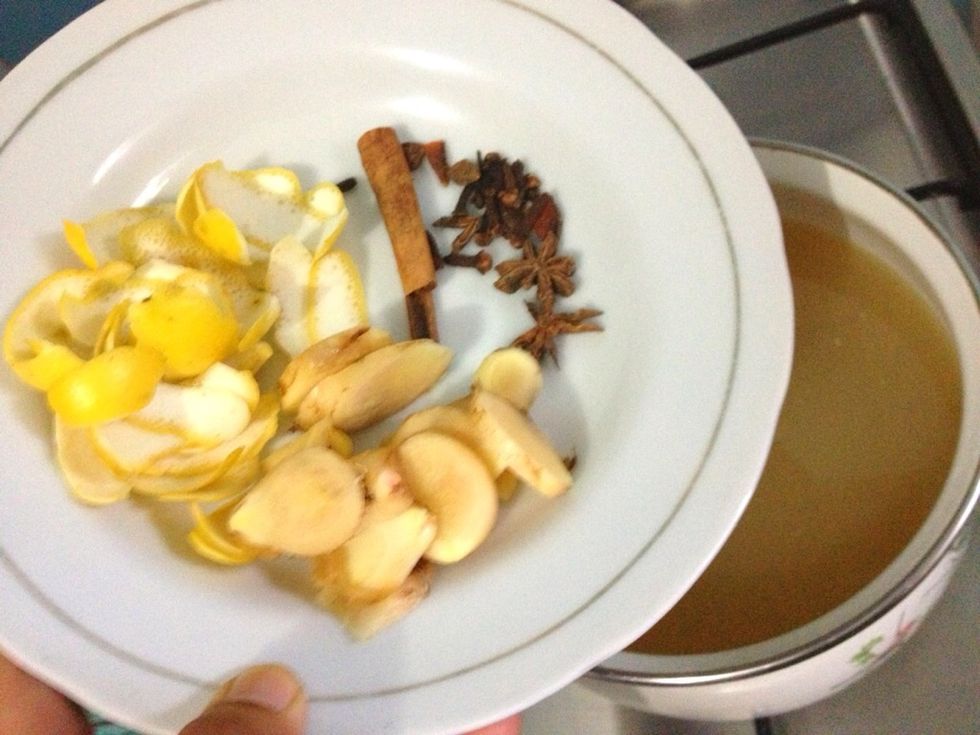 In a medium saucepan, over medium-high heat. Add in 3 cups of water, 1 cup of sugar, 1 cup of honey and ur spices. Boil until syrup is thick and is reduced to 2.5 cups (about 12-14 mnts).