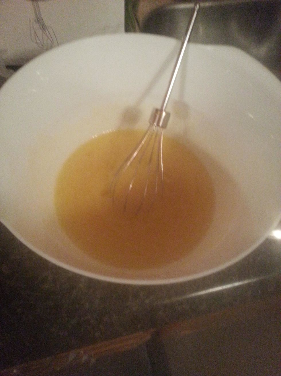 In a medium sized mixing bowl whisk the eggs until blended, about 15 seconds. Add the sugar and whisk until combined.