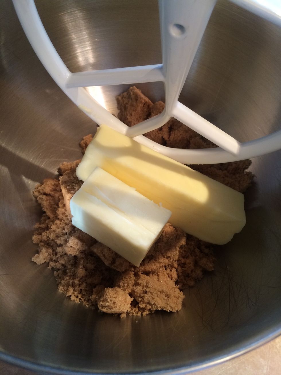 In a mixer fitted with a paddle, add brown sugar and butter.
