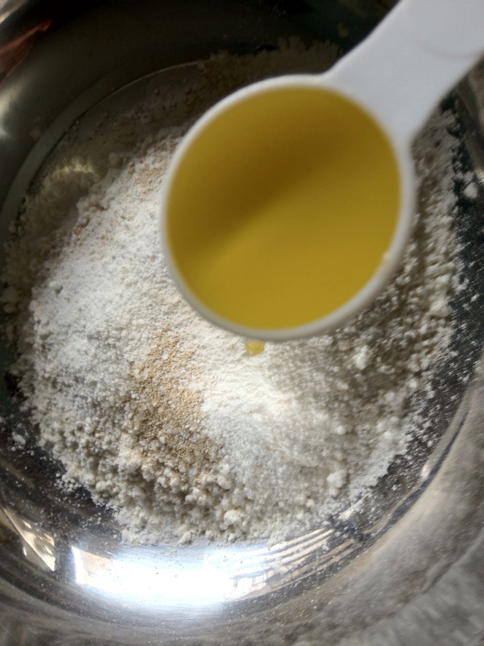 In a mixibg bowl, mix all of the component except water