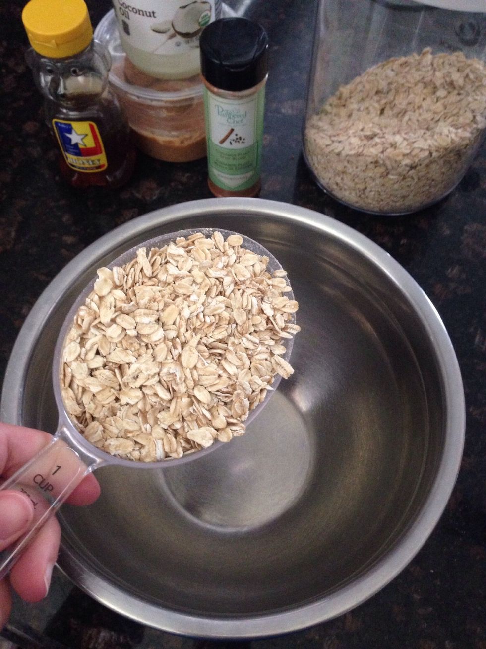 In a mixing bowl, add 1 cup rolled oats (any brand)
