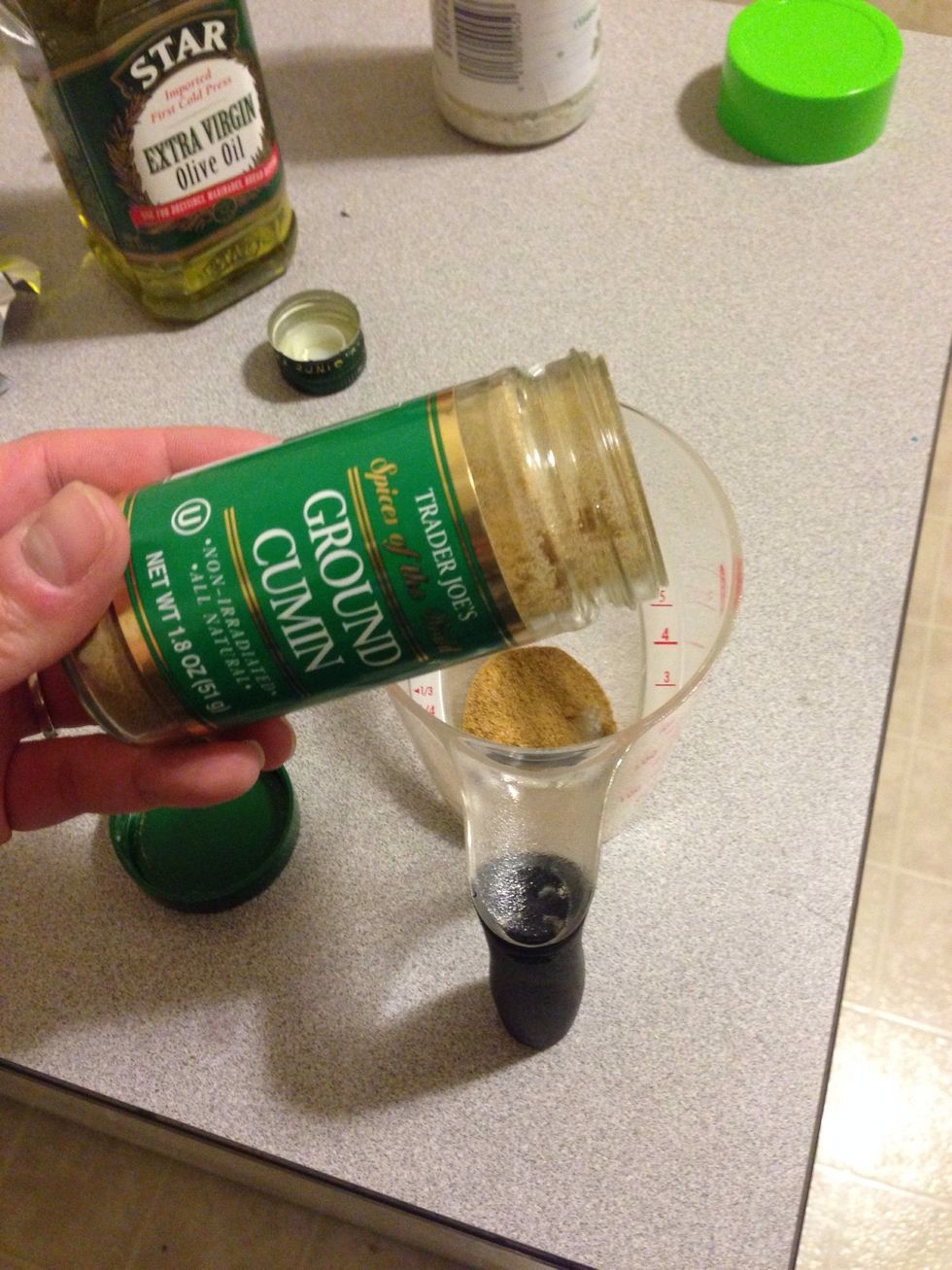 In a mixing bowl, add 2 tsp of cumin.
