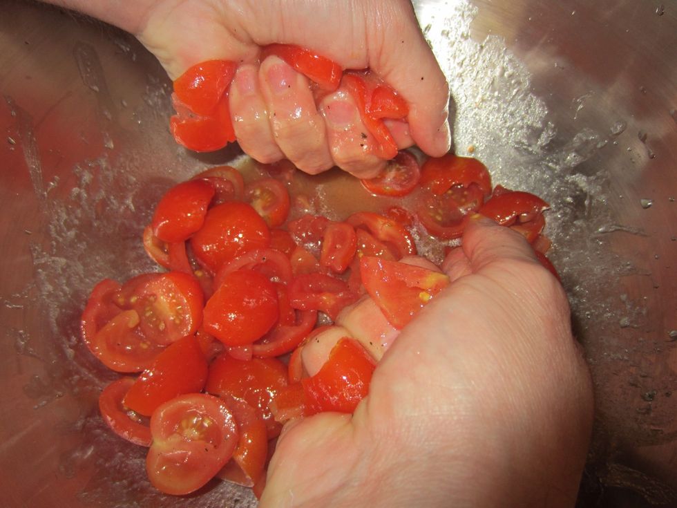 In a mixing bowl add tomatoes and add Tessemae's dressing ( don't be bashful) then squeeze it all with hands to get all the juices out of the tomatoes.