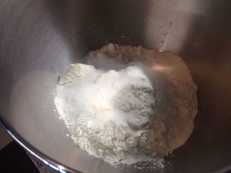 In a mixing bowl, combine the dry ingredients.