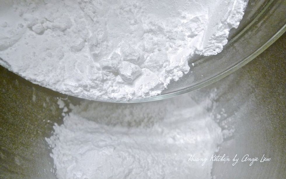 In a mixing bowl of a stand mixer, combine wheat starch and the tapioca flour.