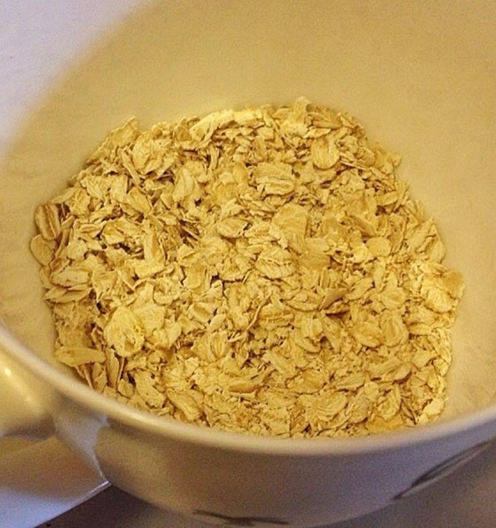 In a mug mix oatmeal..