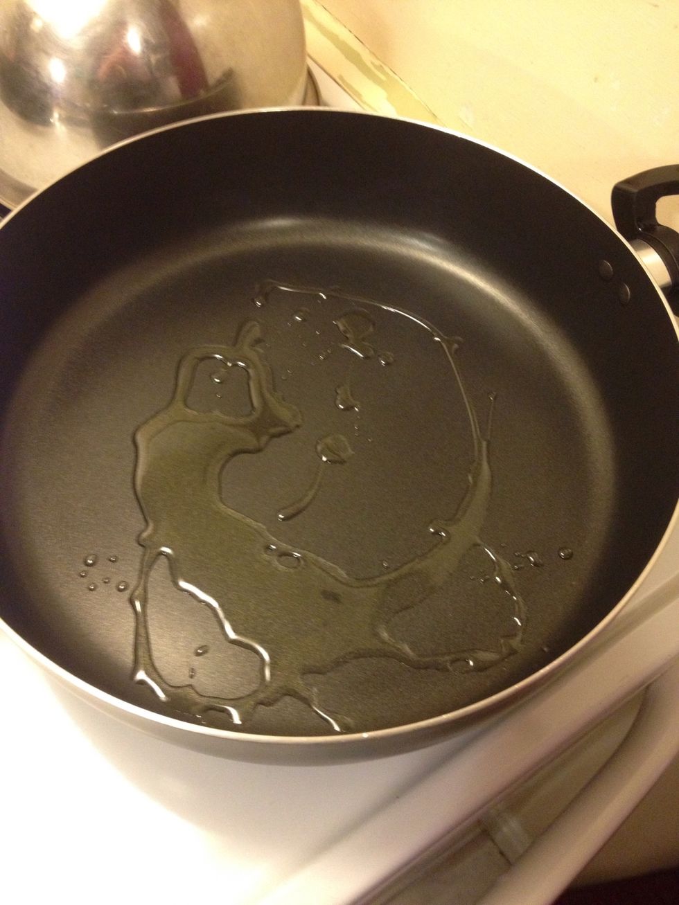 In a pan add 1 T olive oil