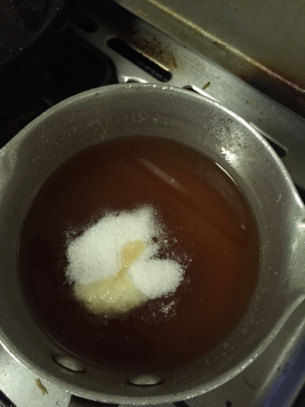 In a pan mix corn syrup , 2 cup of sugar and half cup of water bring to nice boil.