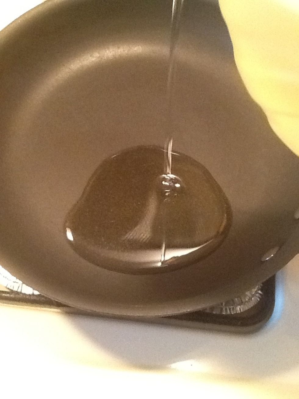 In a pan over medium heat add a cup of oil. I used canola oil. You can use olive oil.