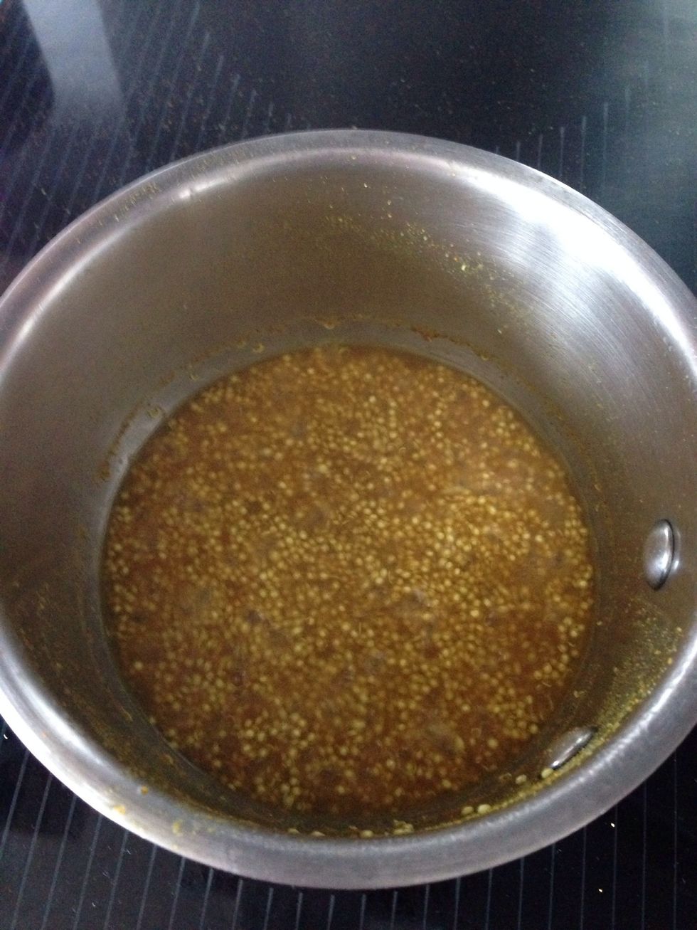 In a pot add quinoa, water, ginger, garlic, curry, tumeric and salt. Bring to a boil, when boiling put the lid on the pot and and bring the temperature to a simmer.