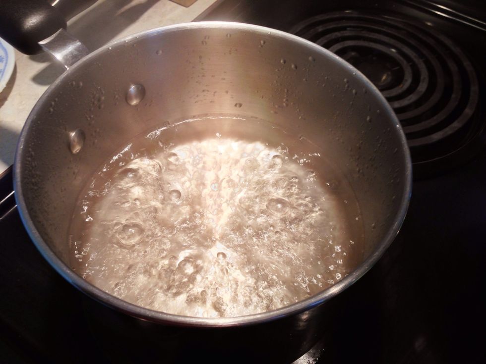 In a pot, boil water. This will be used for your double boiler.