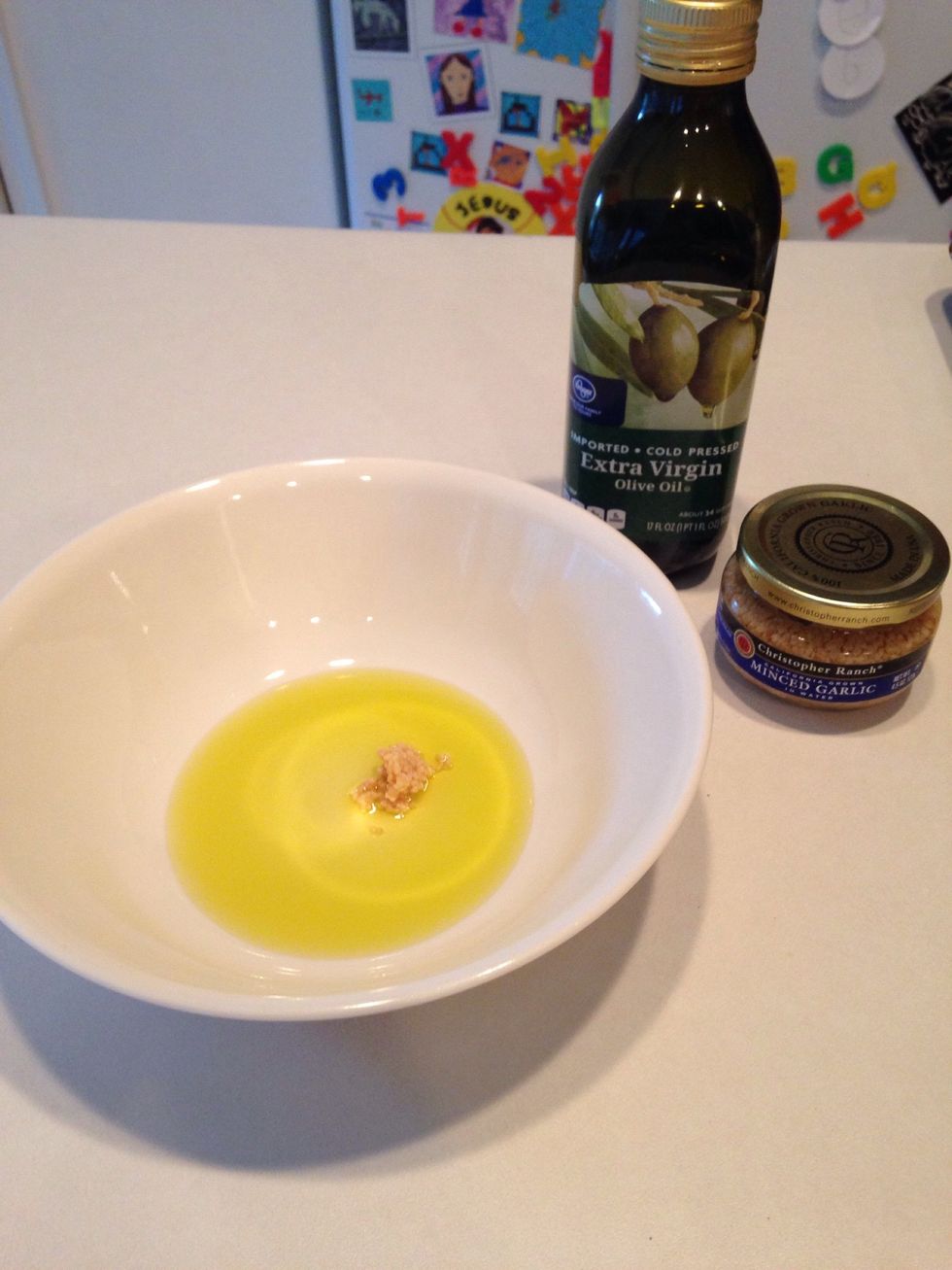 In a separate bowl, add 3 Tbsp oil and 1tsp garlic.