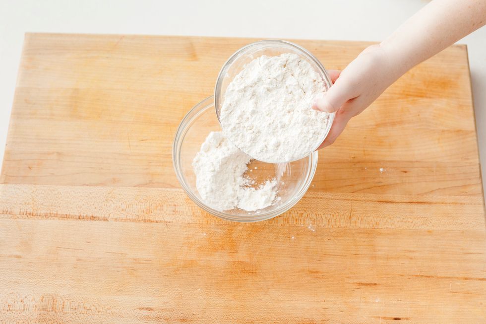 In a separate bowl, add flour.