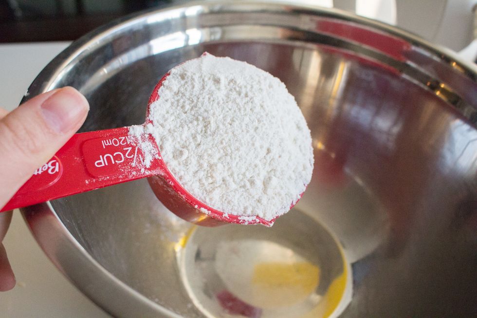 In a separate bowl, add flour.