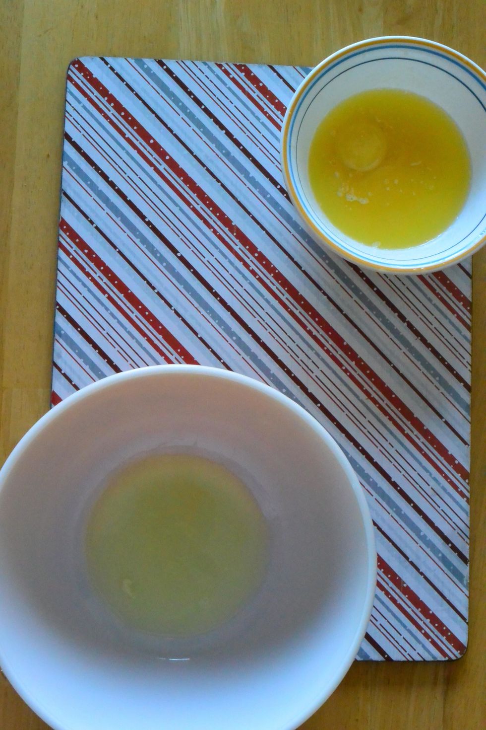 In a separate bowl, add the separated egg whites. Add in 1 Cup yogurt and 1 Cup milk.