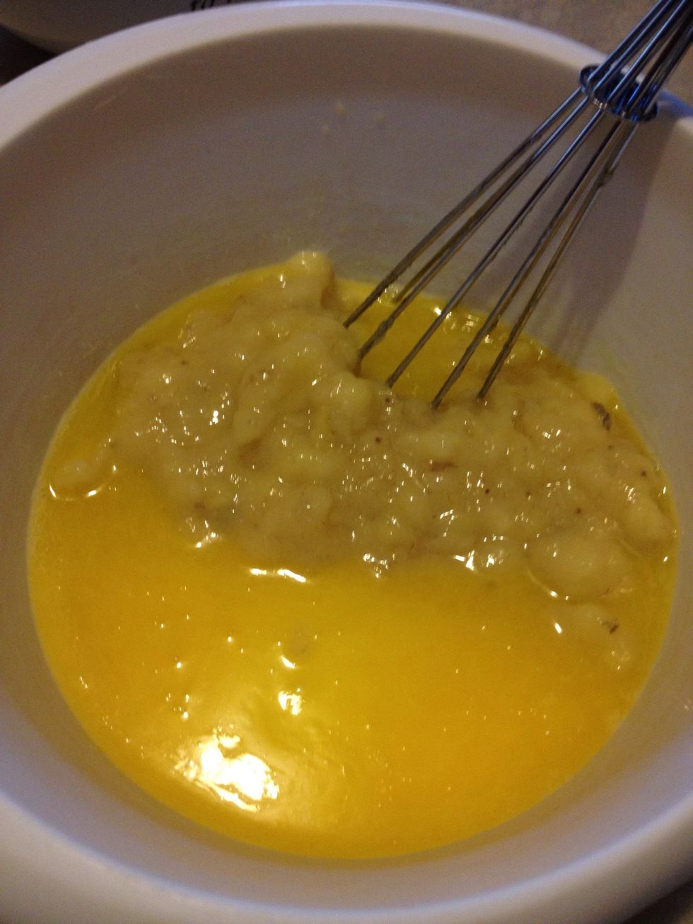 In a separate bowl, beat mashed bananas, sugar, egg, and melted butter.