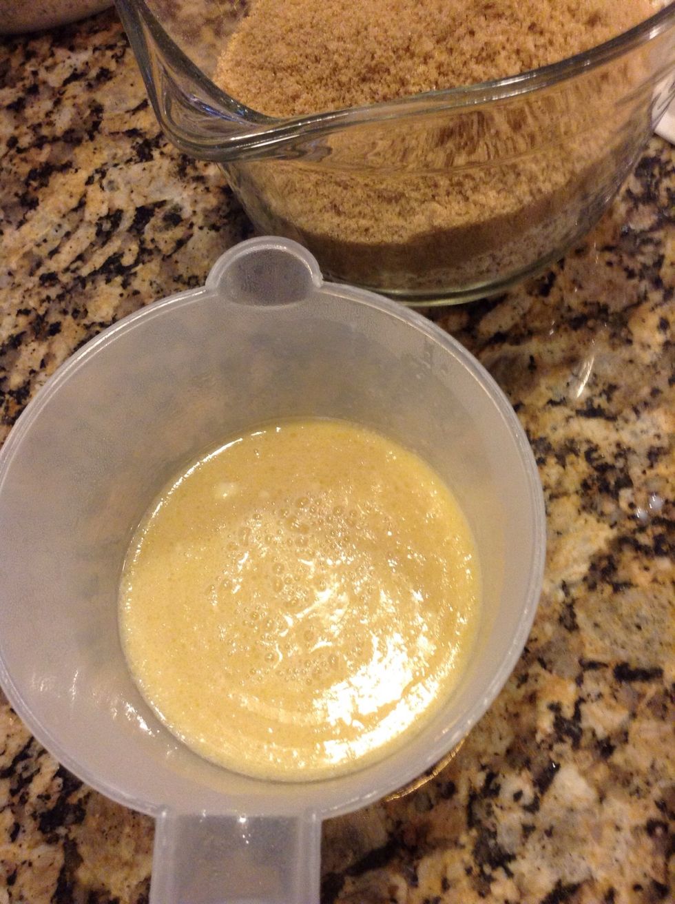 In a separate bowl melt a stick of butter. Add: 1 cup milk, 2 tsp vanilla and 2 eggs. Mix well