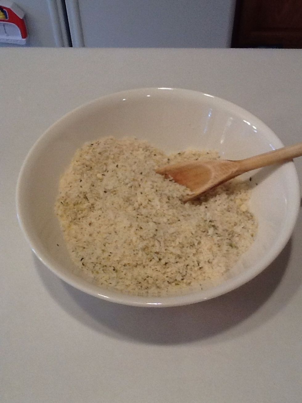 In a separate bowl, mix Panko breadcrumbs, 2/3 c Parmesan cheese, oregano and basil.