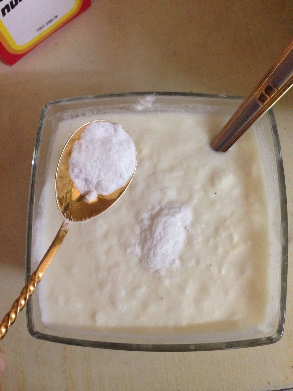 In a separate bowl mix the 400 g cream and  1,5 tea spoon baking soda