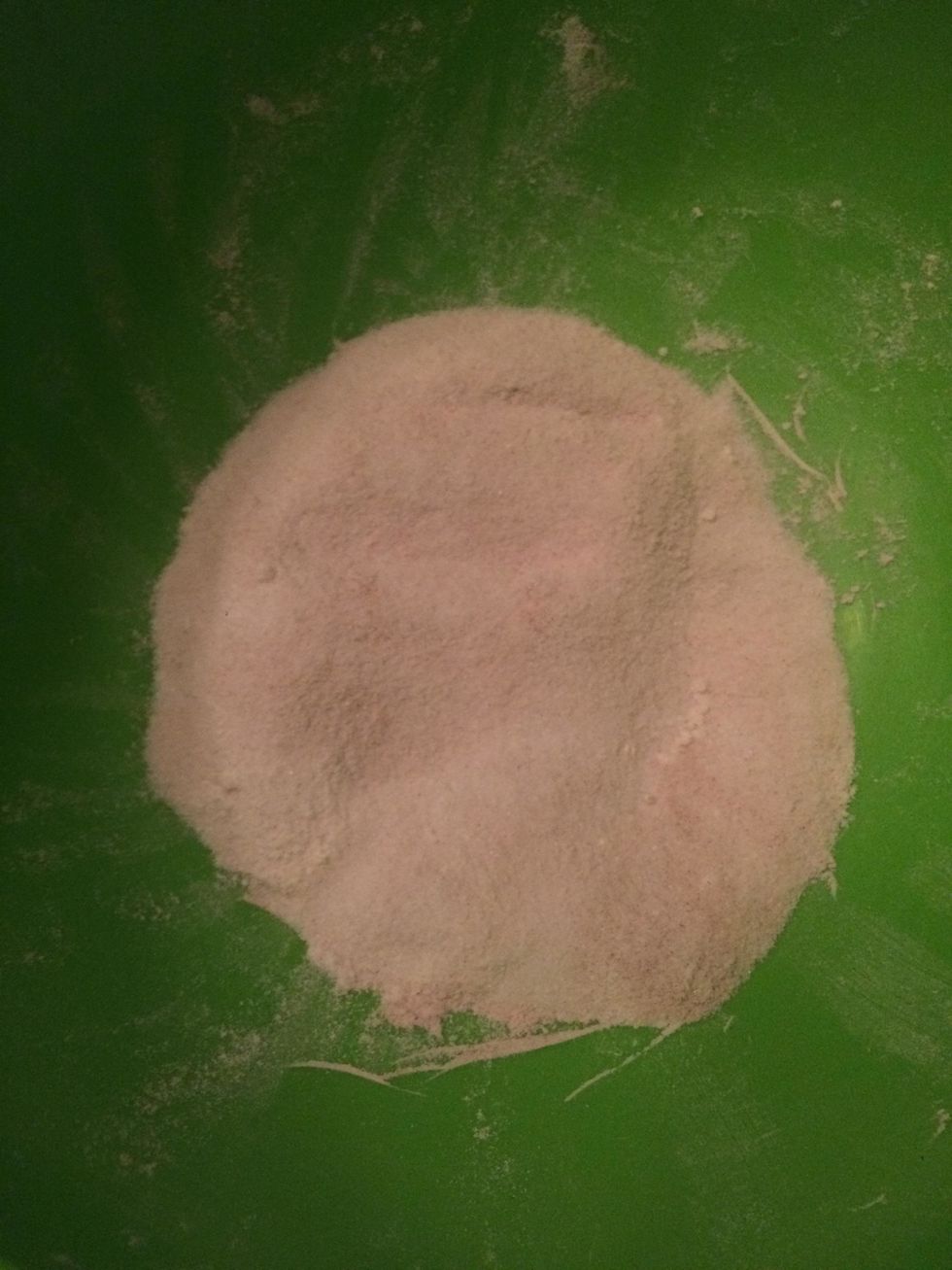 In a separate bowl, mix together the 1/2 cup of sugar, 3 tablespoons of flour, 1/4 teaspoon of cinnamon, and a pinch of salt.