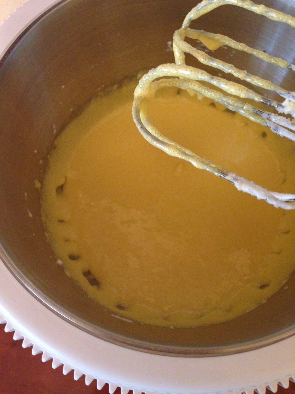 In a separate bowl mix yolks with sugar until pale