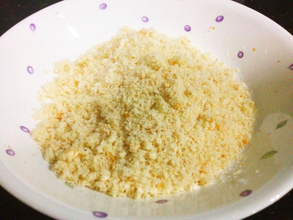 In a separate bowl, (shallow and wide as well) place your breadcrumbs. I made mine myself, simply by pulsing two slices of bread in my food processor till its to the texture of my liking :)