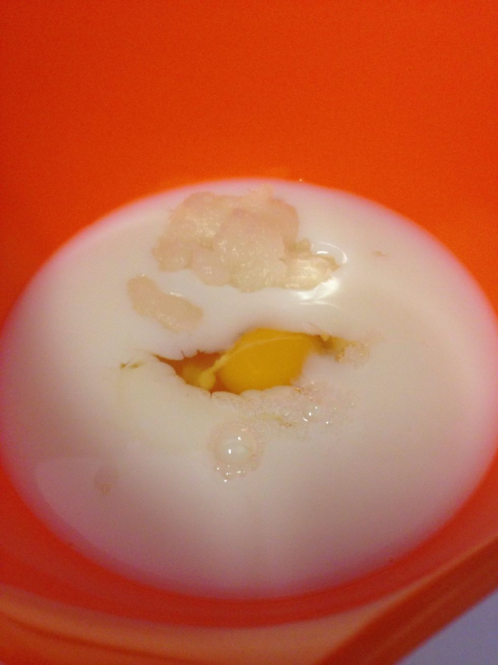 In a separate bowl, whisk together the skim milk, egg, and softened coconut oil. (Your coconut oil might get lumpy when it touches the cold milk, but just whisk it the best you can!)