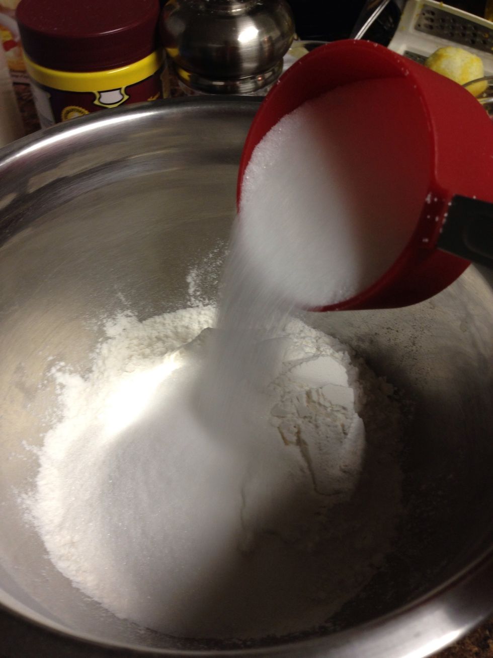 In a separate mixing bowl, mix together flour, sugar, baking powder, salt and nutmeg.