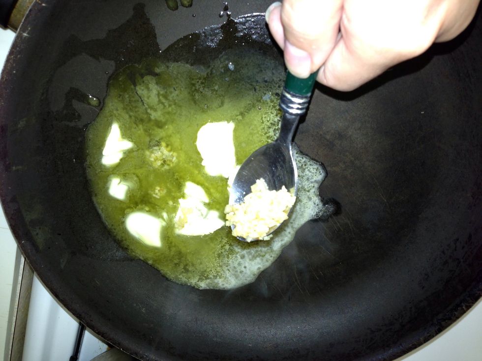 In a separate pan, add butter, garlic, and a little salt.