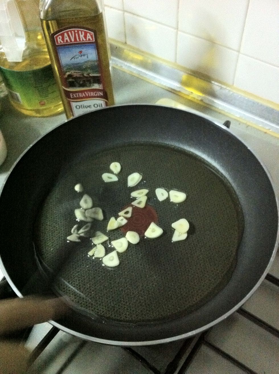 In a separate pan, combine the olive oil and garlic (aglio which means garlic, olio is for oil) \ud83d\ude09