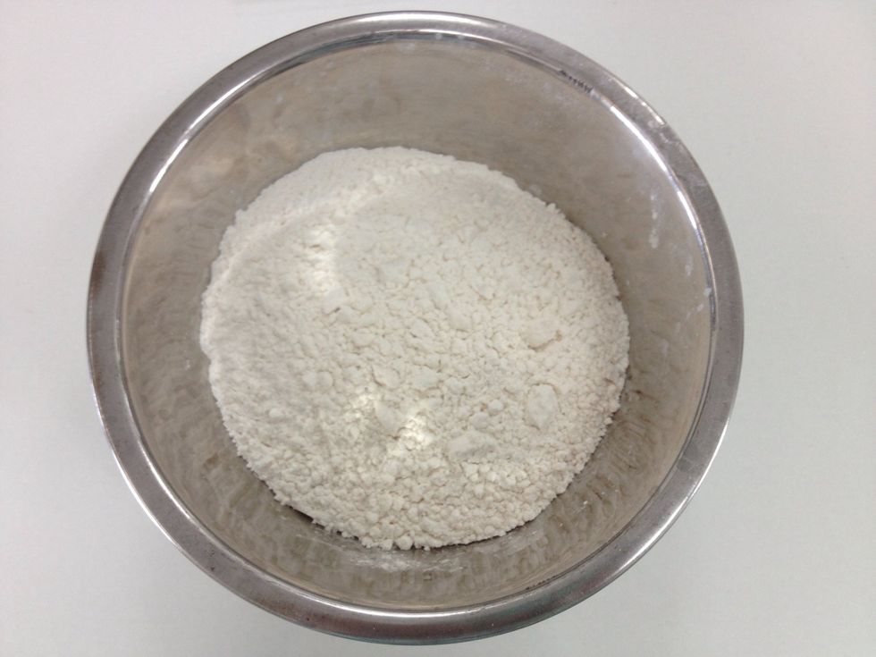 In a separated bowl, combine the flour and baking powder.