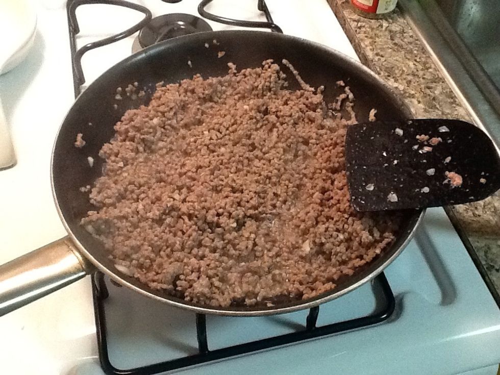 In a skillet cook the beef, onion, and garlic. Add salt and pepper for flavor. Drain off the fat.