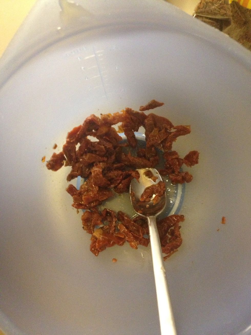 In a small bowl add chopped sundried tomatoes, I used the ones in oil.