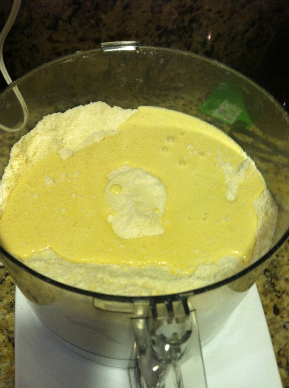 In a small bowl, beat the egg, vanilla, and cream together, then add it to the flour mixture.