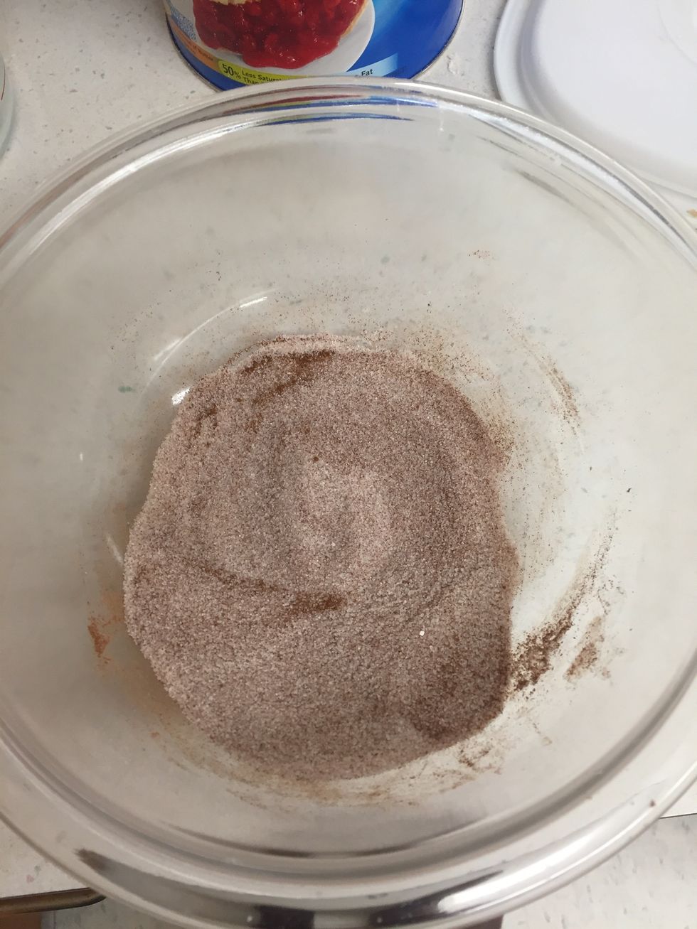 In a small bowl, combine sugar and cinnamon.