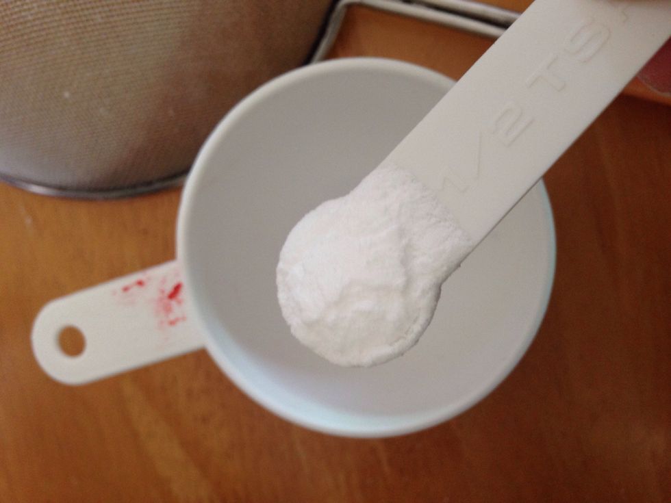 In a small cup, prepare 1 and 1/2 teaspoons of soda bicarbonate and add into it 1 and 1/2 teaspoon of vinegar. Stir and Add to the mixture when the chemical reaction is still taking place