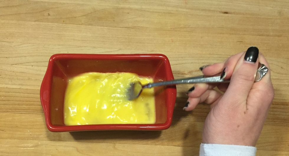 In a small dish, mix together the two eggs until smooth.